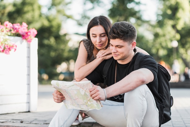 Couple exploring city map