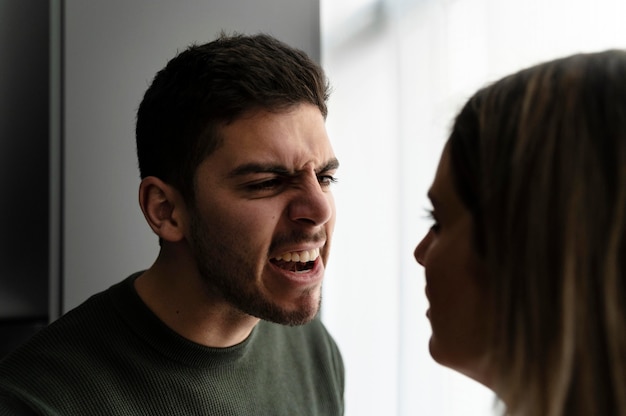 Couple fighting with anger at home