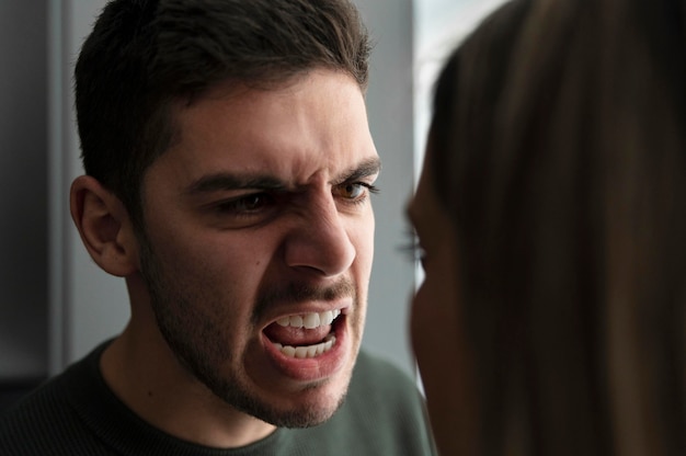 Free photo couple fighting with anger at home