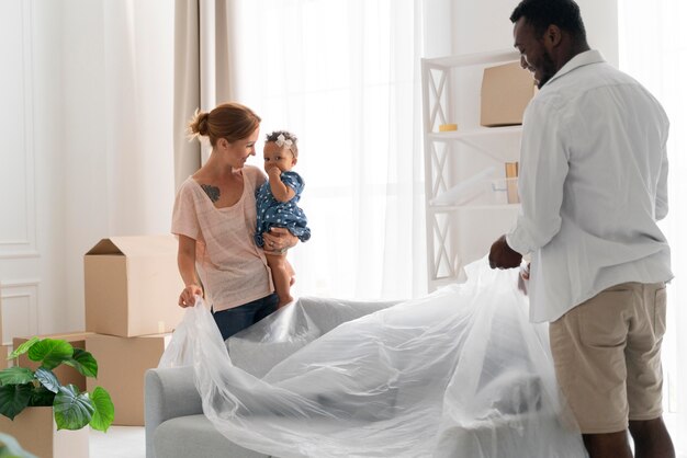 Couple getting ready to move with their daughter