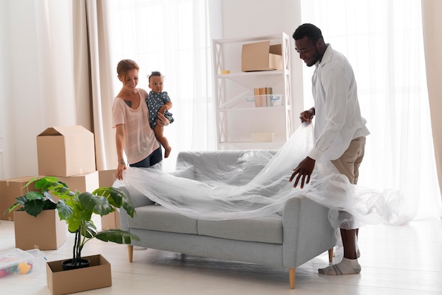 Couple getting ready to move with their daughter