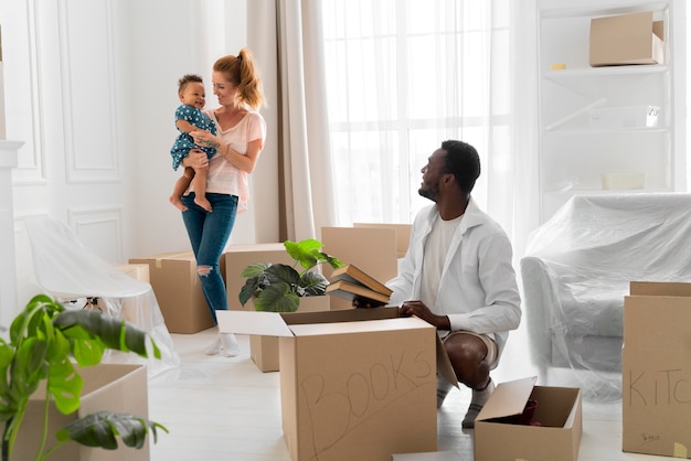 Couple getting ready to move with their daughter