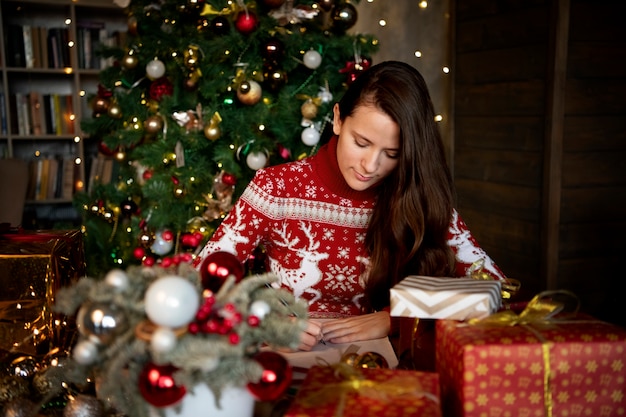 Couple giving each other christmas gifts