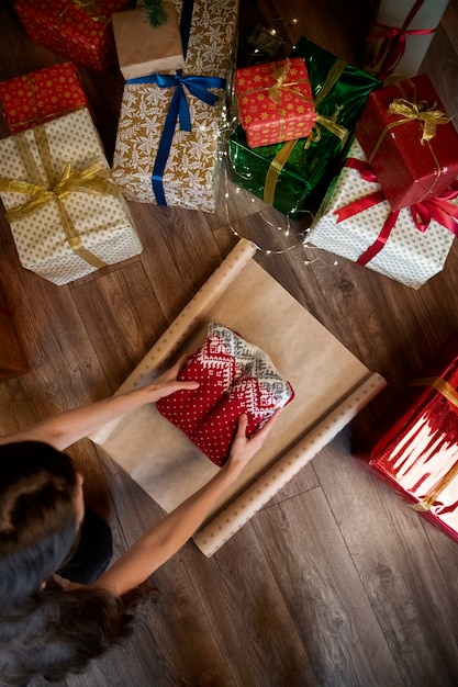 Couple giving each other christmas gifts