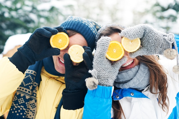 Couple have fun with natural vitamins in winter