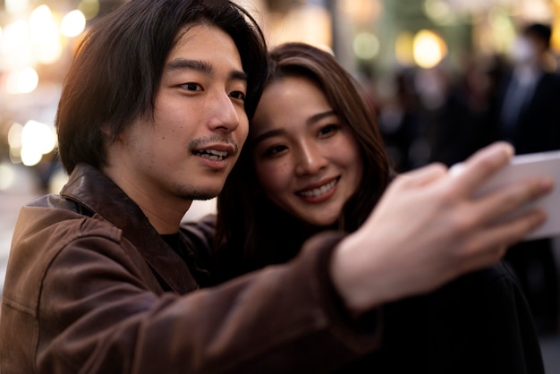 Free photo couple having a date at night