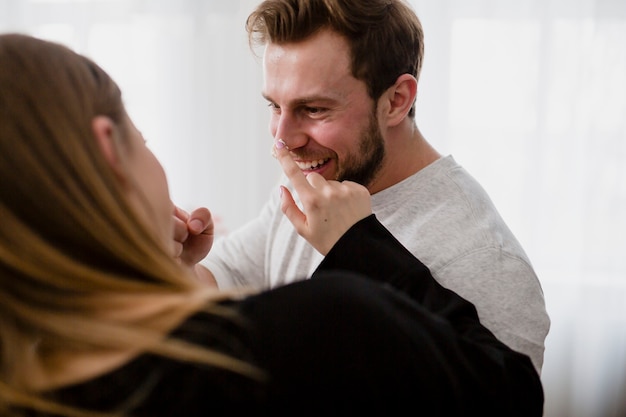 Couple having fun in kitchen