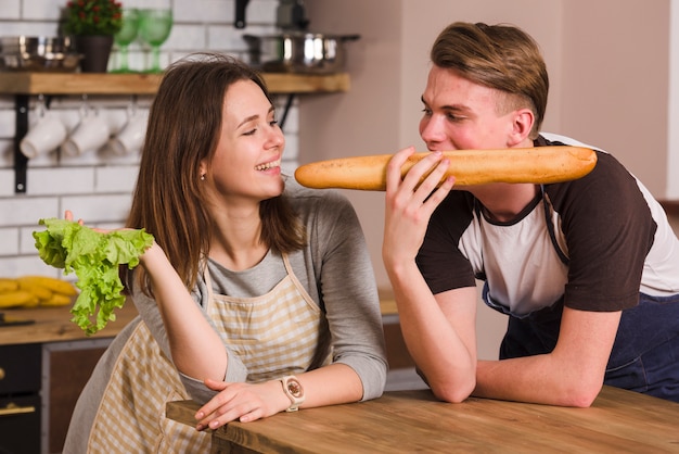 Couple having fun in kitchen