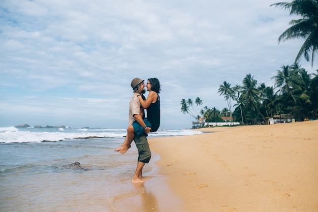 Couple having fun on the seashore