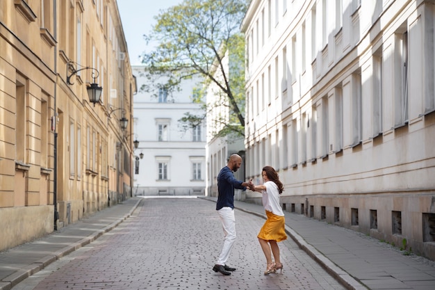 Couple having a latin dance performance in the city