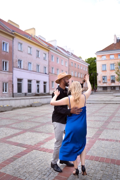 Couple having a latin dance performance in the city