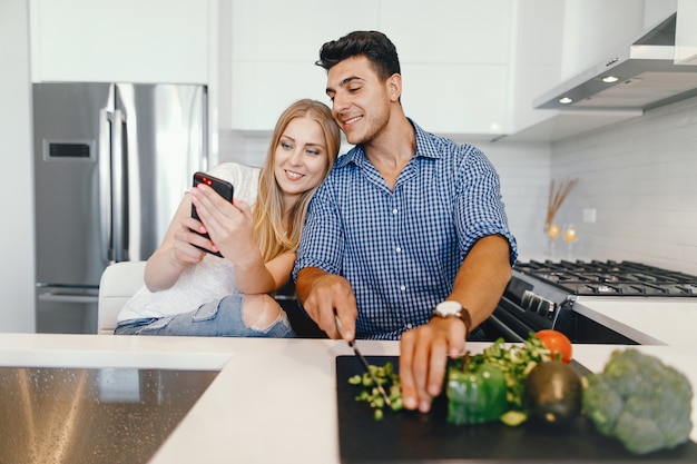 couple at home in a kitchen