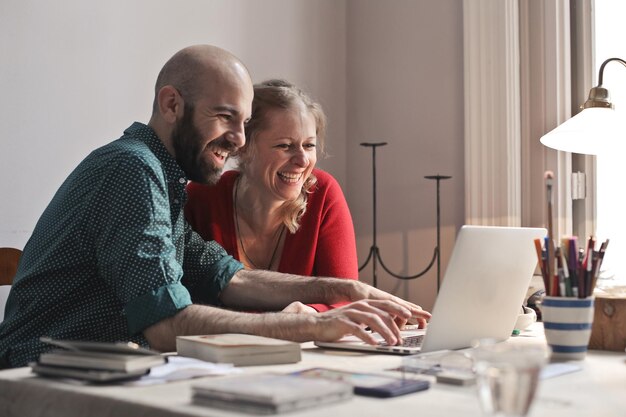 Couple at home working on computer