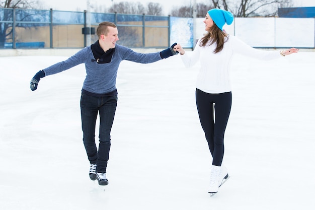 Free Photo couple on the ice rink