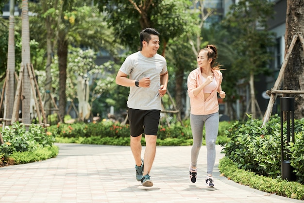 Couple jogging in park