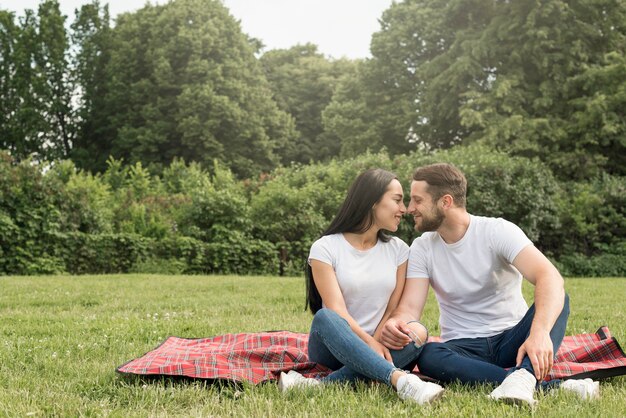 Couple kissing at the park