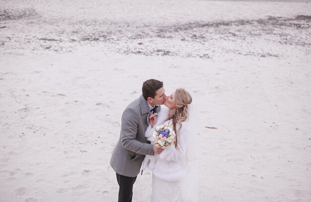 Couple kissing in the snow