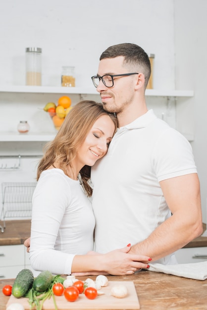 Couple in love cooking together