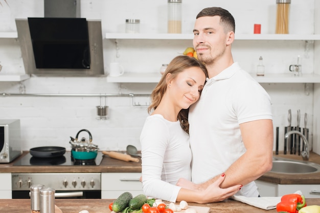 Couple in love cooking together