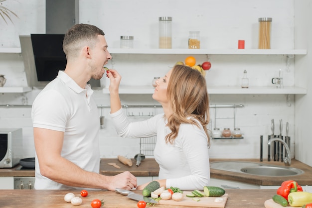 Couple in love cooking together