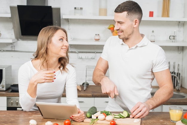 Couple in love cooking together