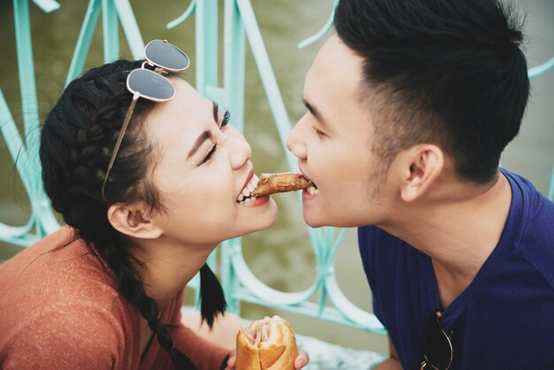 Couple in love eating together