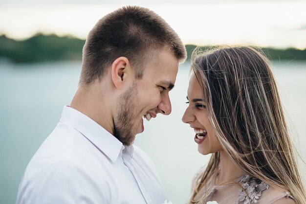 The couple in love smiiling to each other