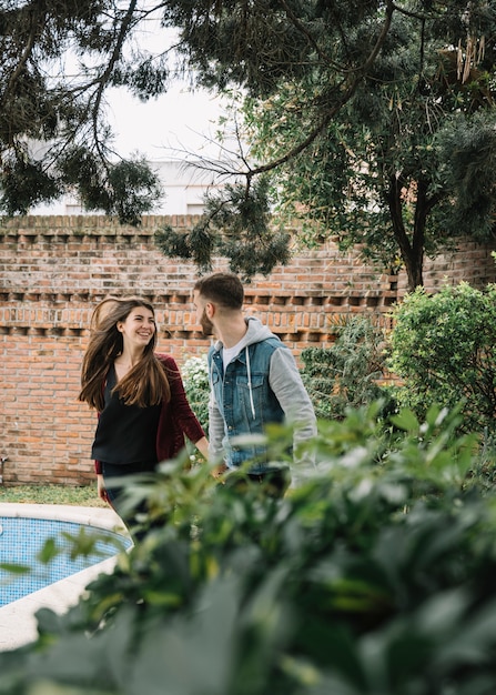 Couple in love walking garden