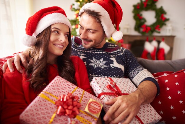 Couple in love with Christmas presents