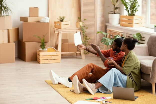 Couple making plans together for renovating home