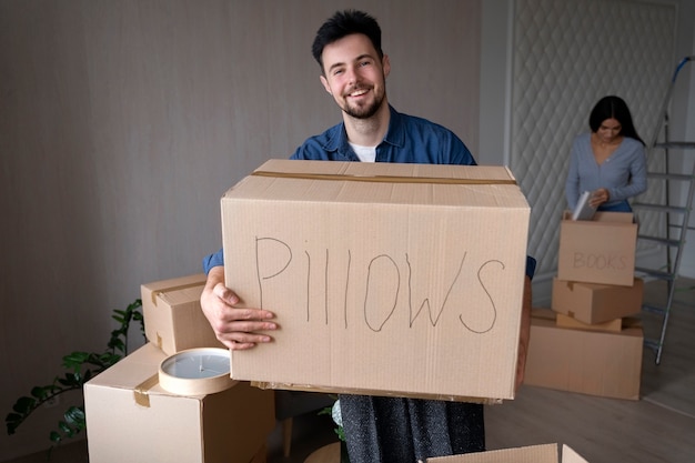 Free photo couple moving in their new home