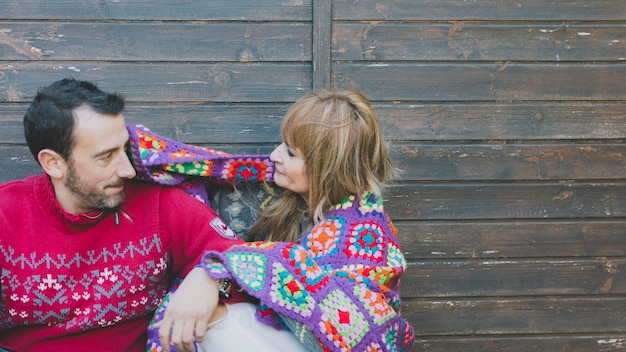 Free photo couple in plaid having fun