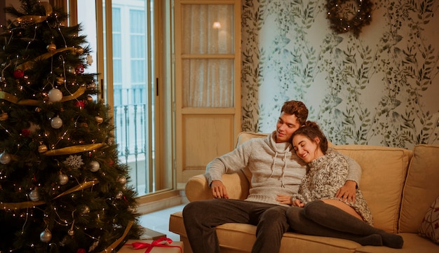 Couple relaxing on sofa 