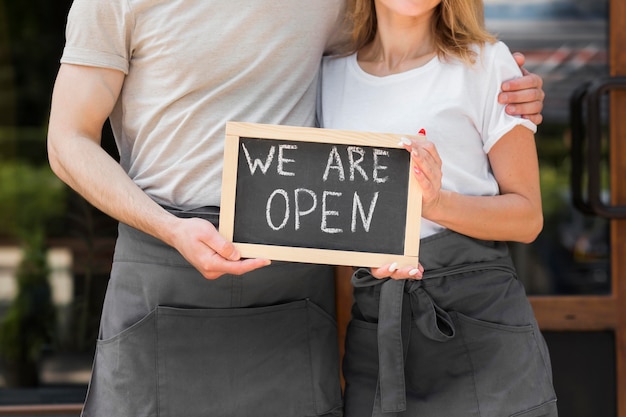 Free Photo couple reopening small business