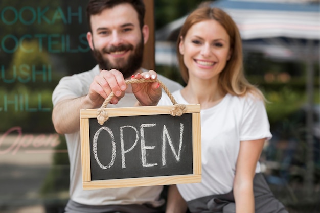 Free Photo couple reopening small business