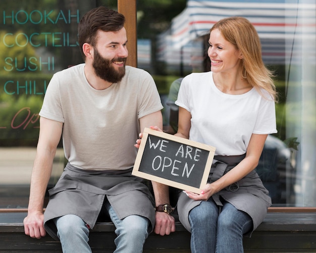 Free photo couple reopening small business