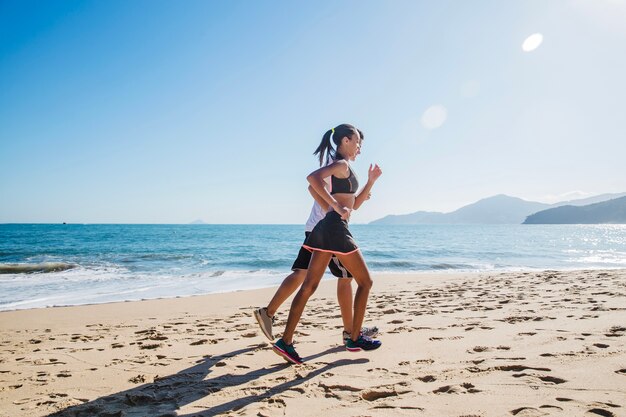 Couple running at the beach