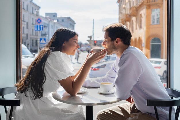 Couple sharing tender public intimacy moments