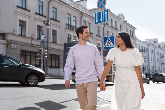 Couple sharing tender public intimacy moments