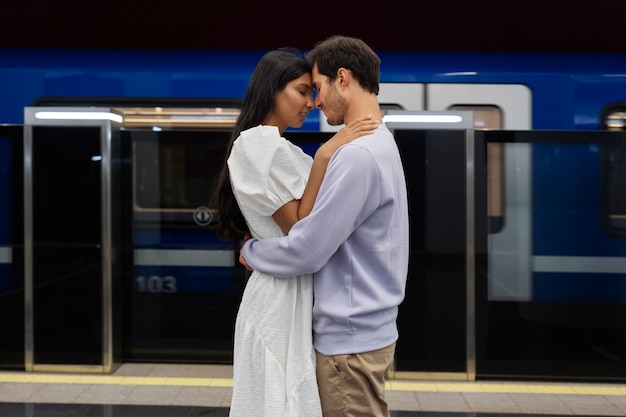 Free photo couple sharing tender public intimacy moments