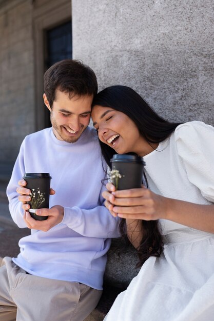 Couple sharing tender public intimacy moments