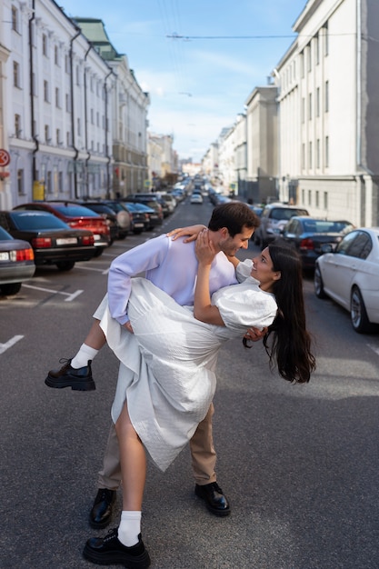 Free photo couple sharing tender public intimacy moments