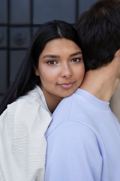 Free photo couple sharing tender public intimacy moments