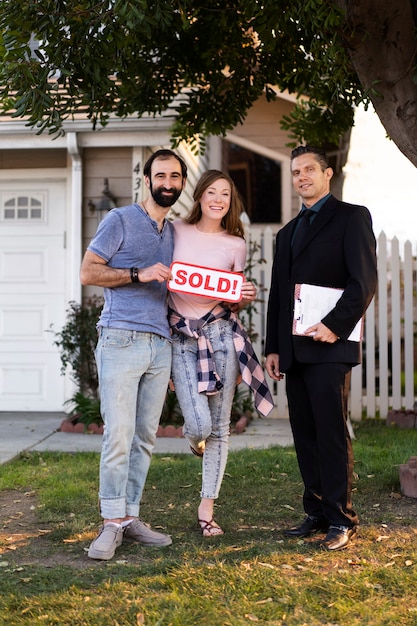 Couple signing papers fr new house