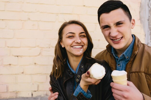 Couple smiling with an ice cream