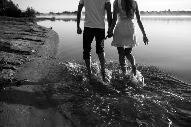 Couple in sunrise on the beach