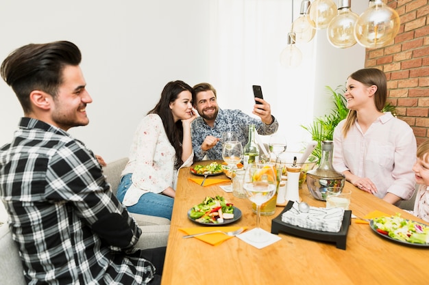 Couple taking selfie on mobile phone