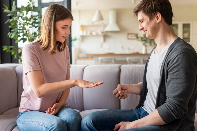 Couple talking using sign language