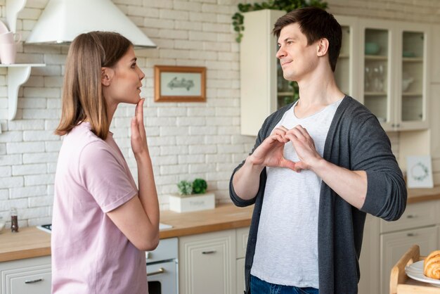 Couple talking using sign language