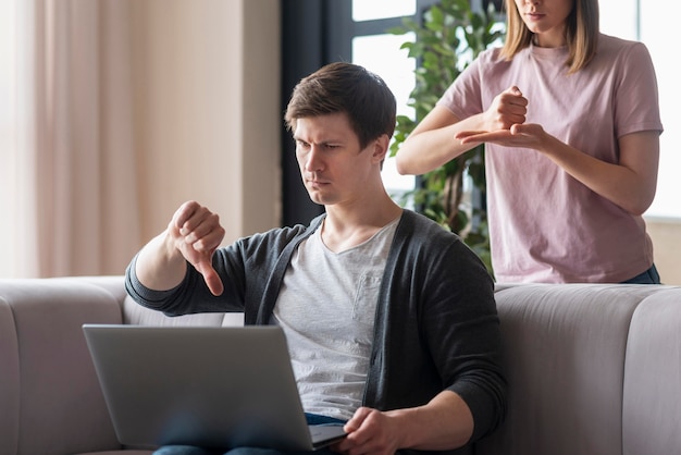 Couple talking using sign language